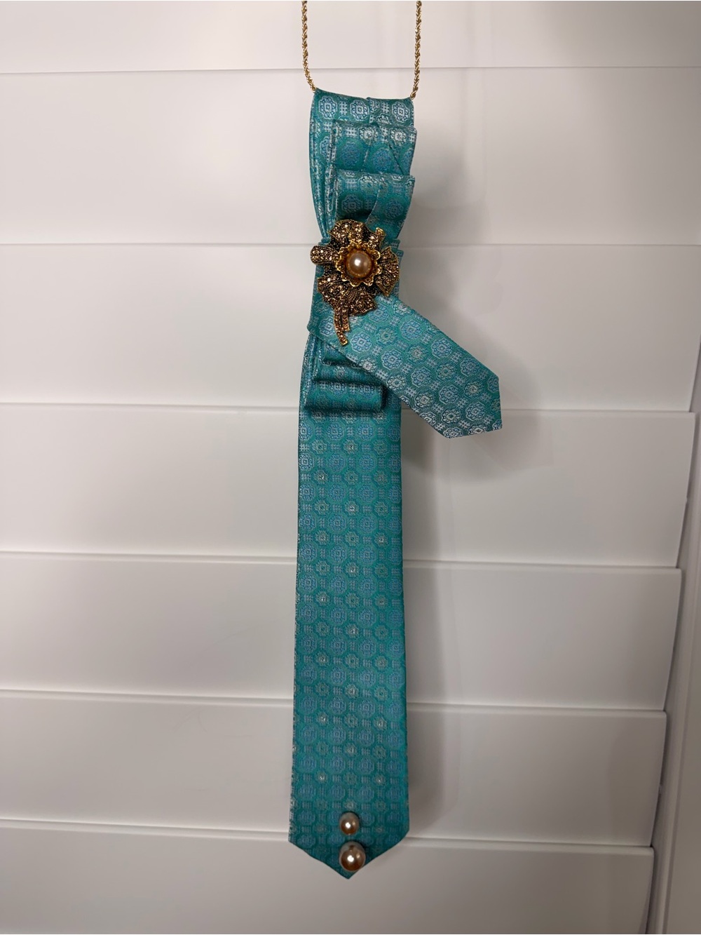Teal Patterned Fabric Necklace with Gold Floral Brooch